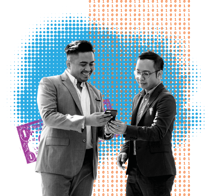 image of two people looking at a phone