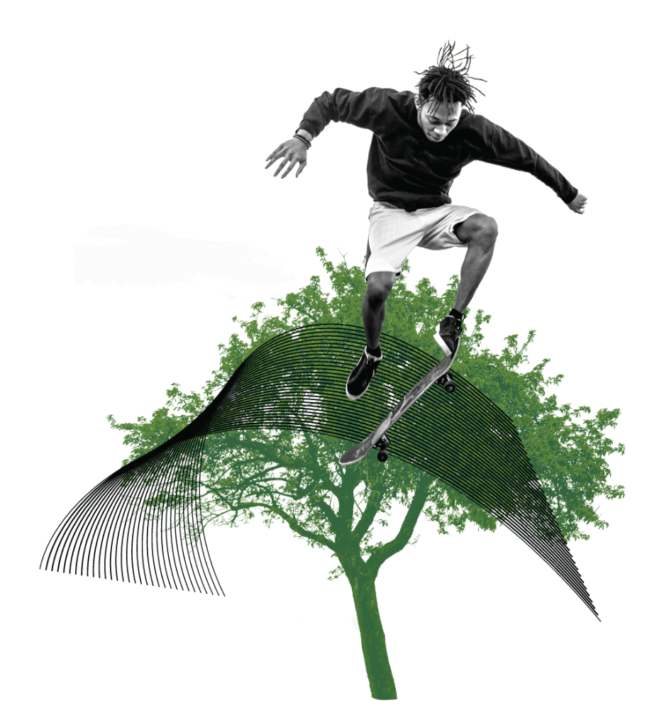 image of young man skateboarding in front of a tree